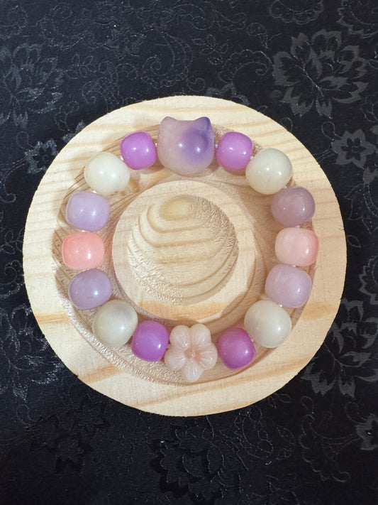 Bodhi Kitty Smelling the Flower